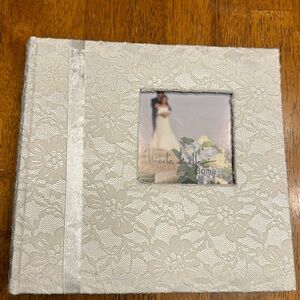 Nicole Miller Home photo album. 9” X 10” (164 -4X6) pics.